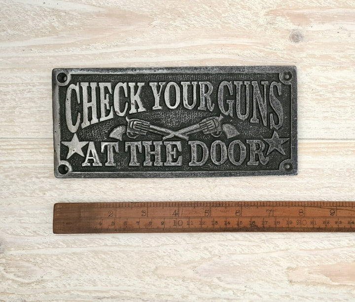 Plaque CHECK YOUR GUNS Cast Ant Iron 200mm x 90mm